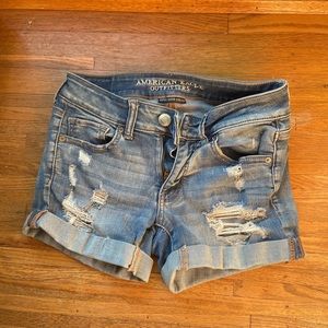 Distressed denim mid rise Jean shorts